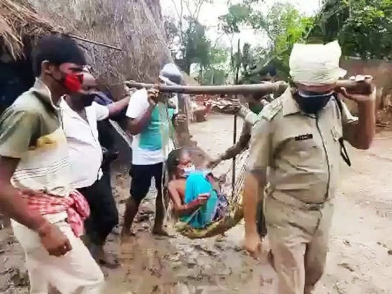 Odisha Police Carry Elderly Woman To Cyclone Shelter