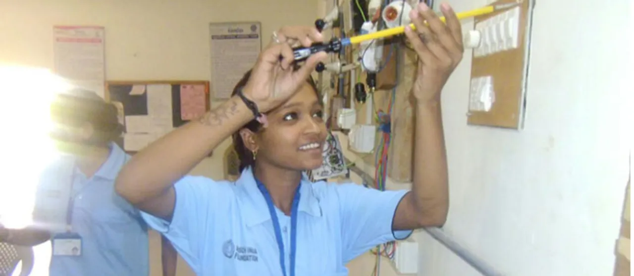 Women being trained to become electricians