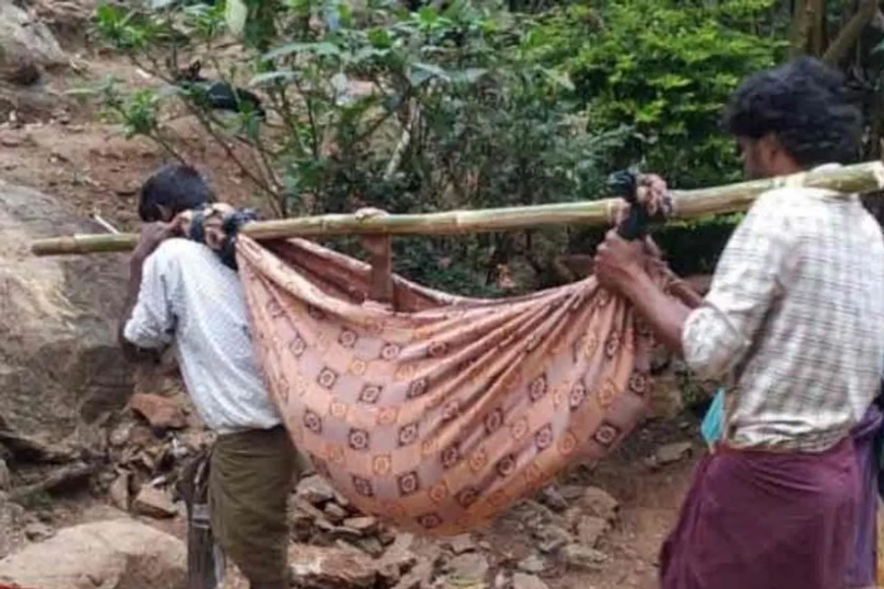 woman carried in a sling