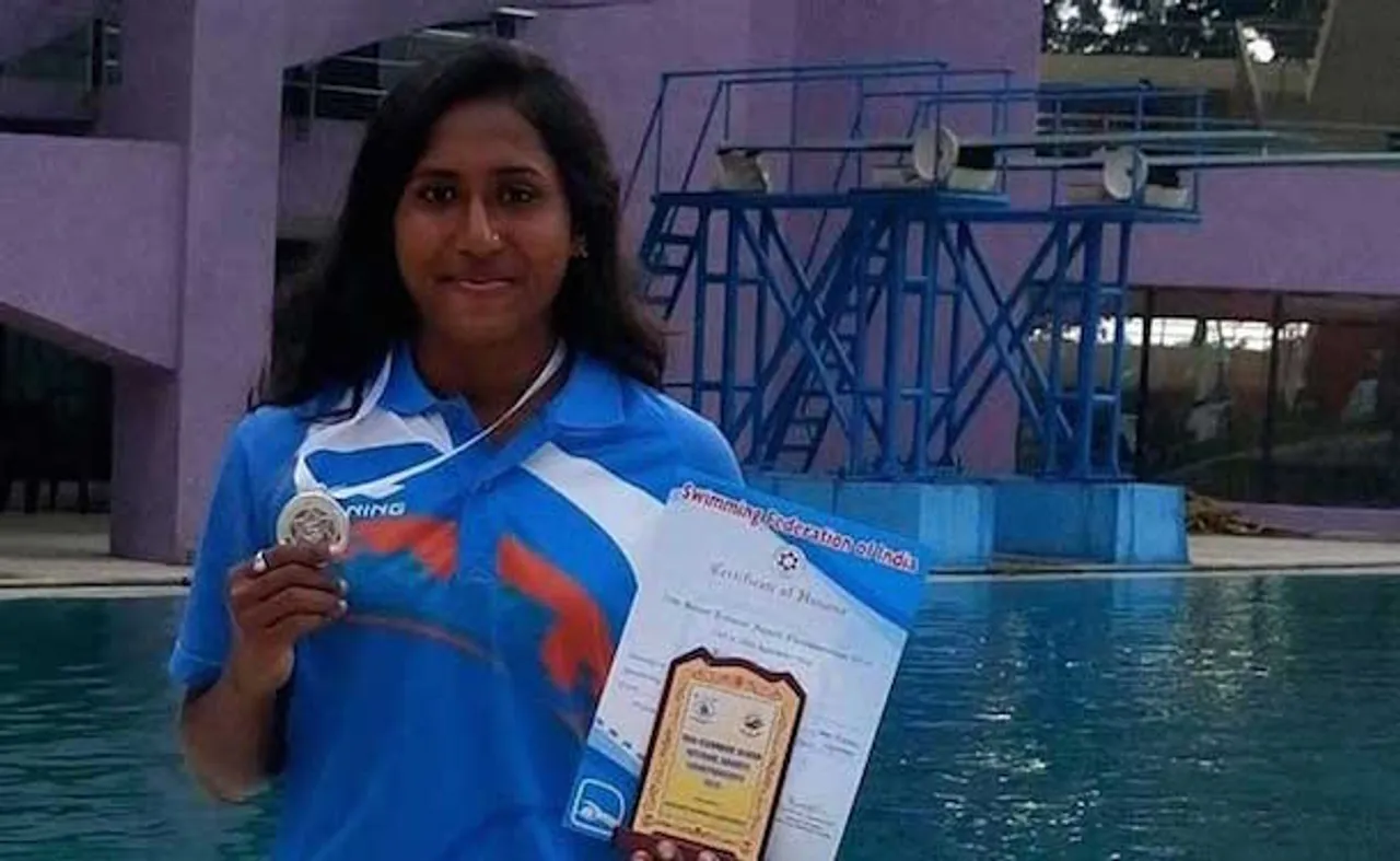 23 year old swimmer hangs herself