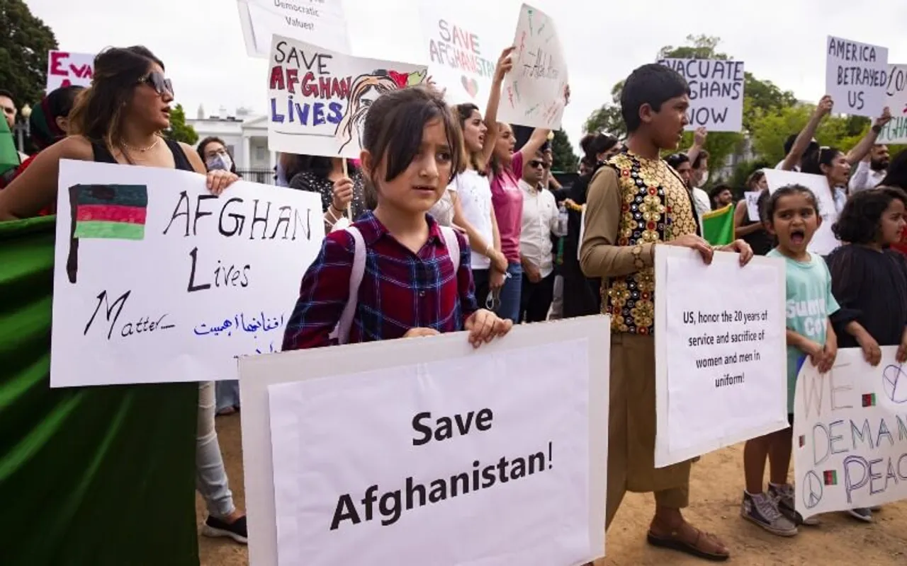 Afghan women cricket team ,herat women's protest afghan journalists ,taliban bans co-education ,Afghan Students Indian Visa