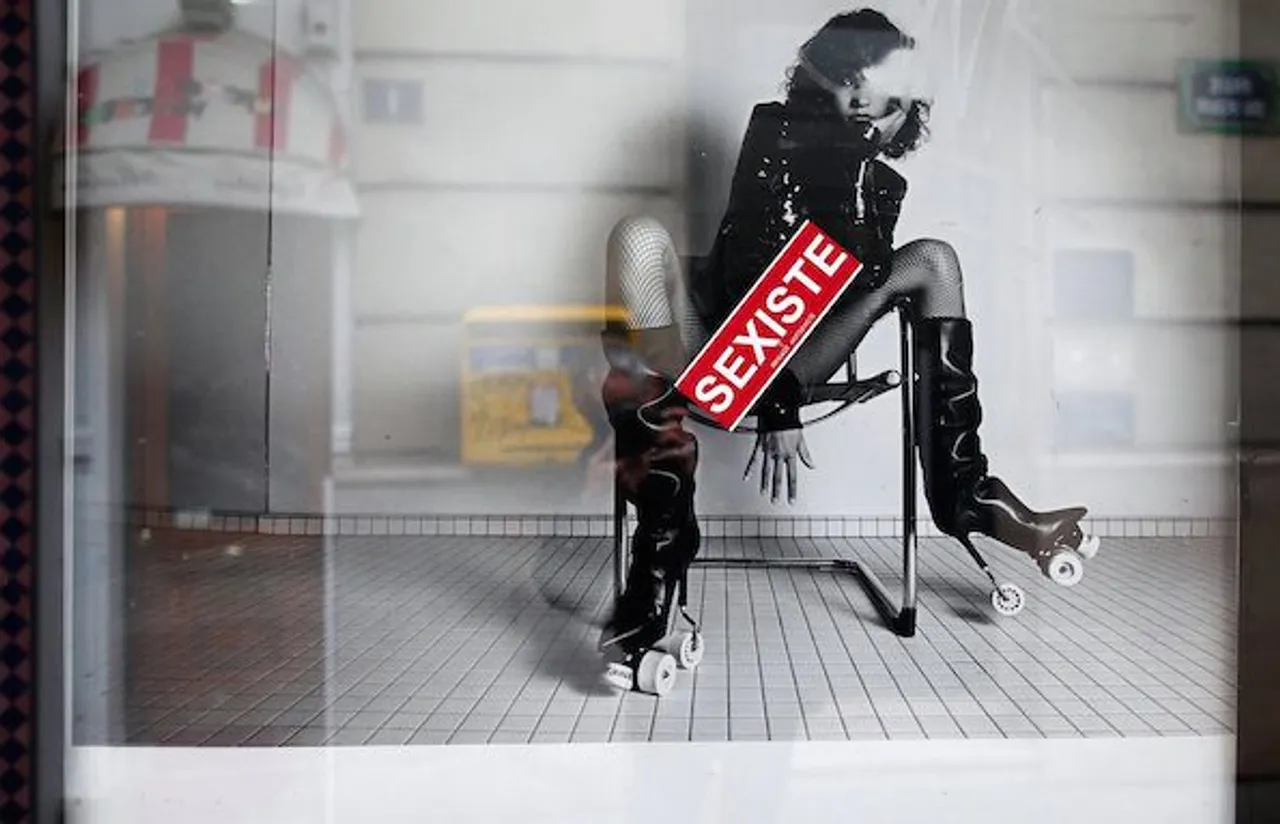 Avenging Sexism: Women's Suit Ad Uses Nude Men As Props