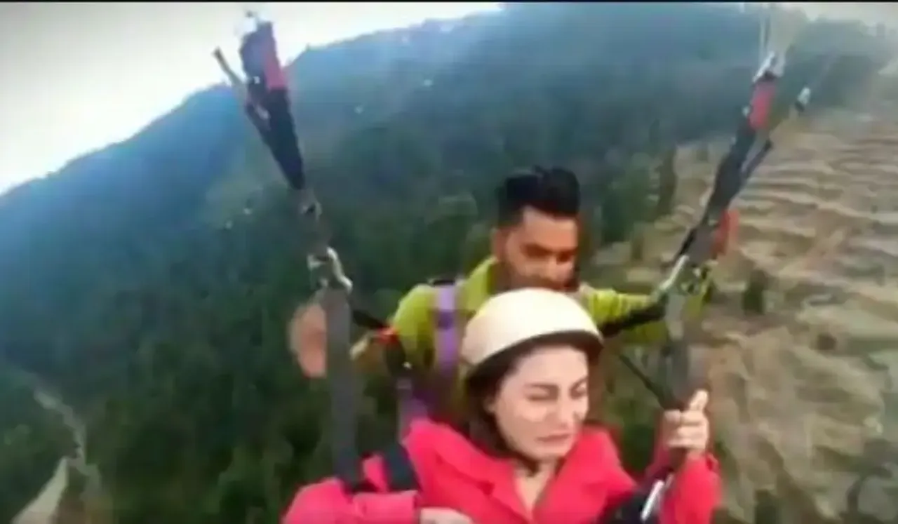 woman paragliding