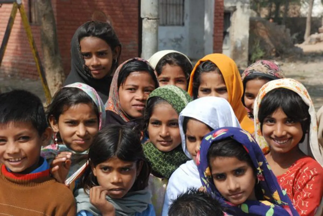 Women build 2-km road