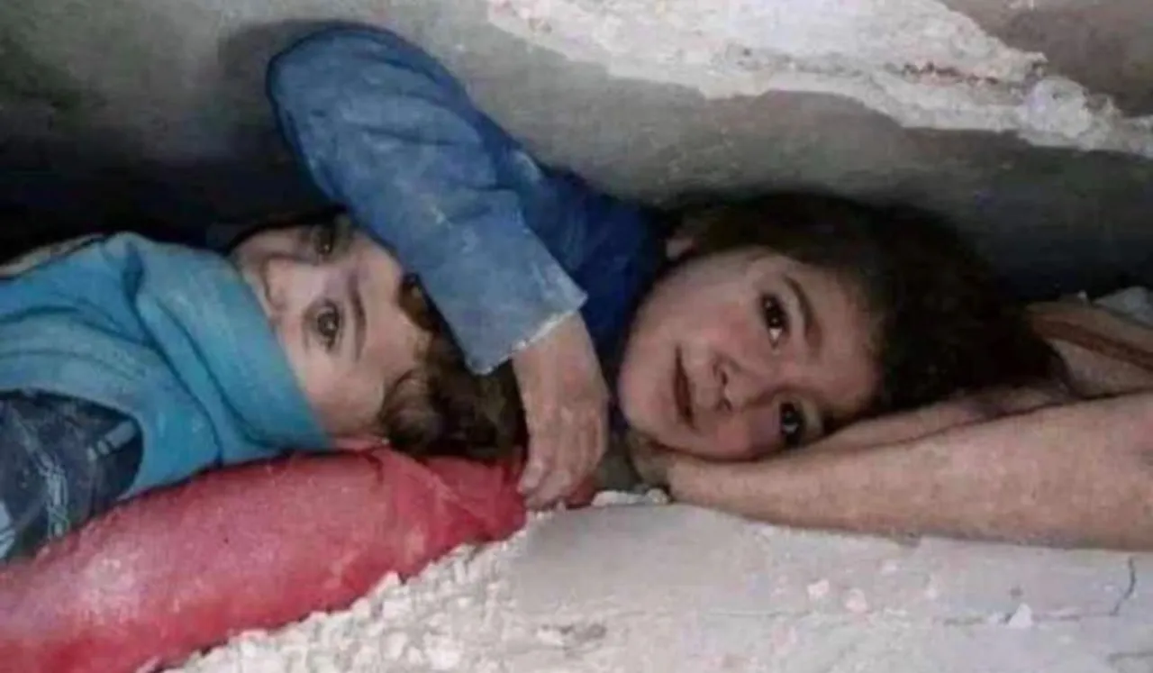Syrian Girl Shields Brother