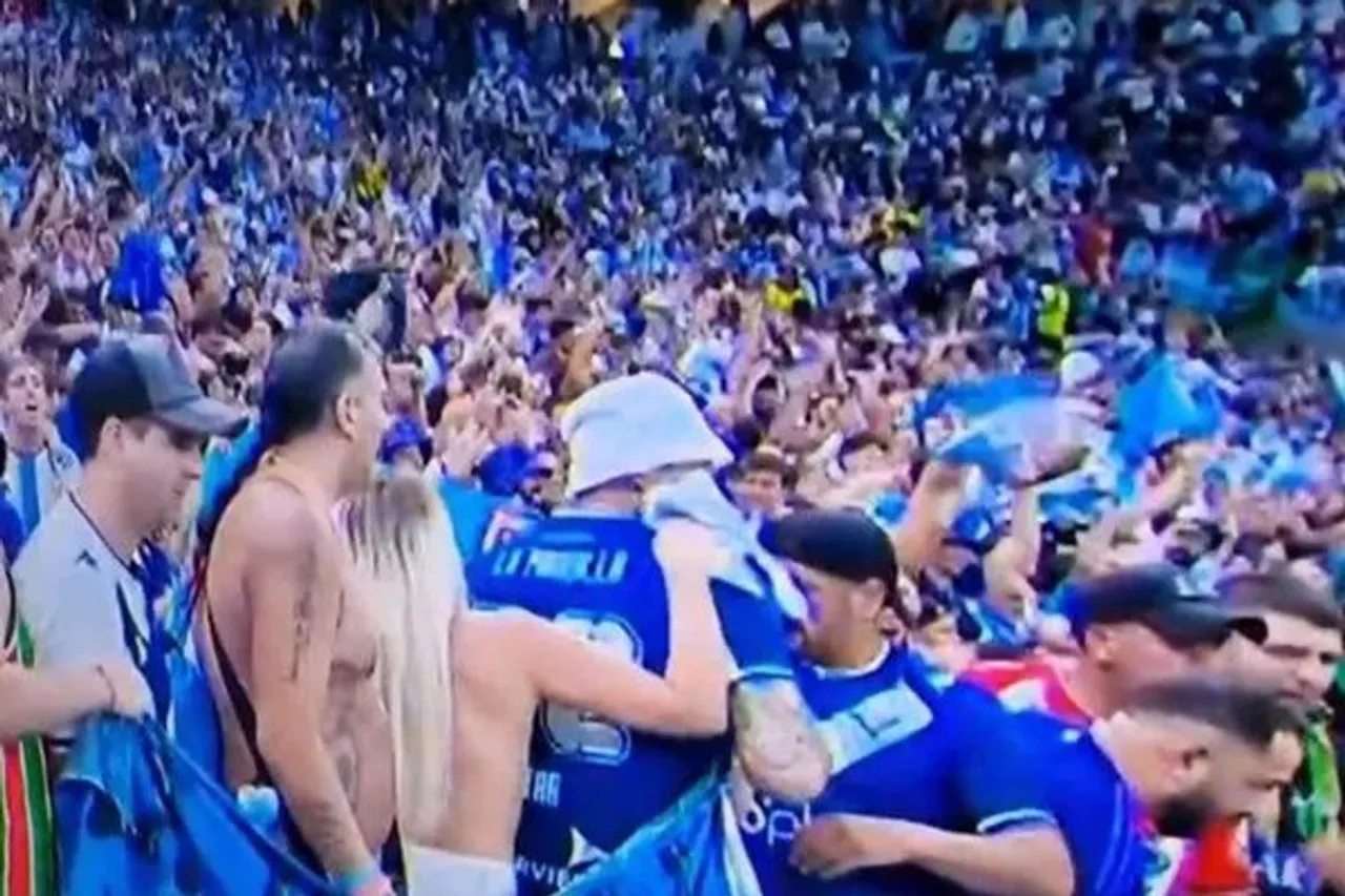 woman goes topless after argentina win