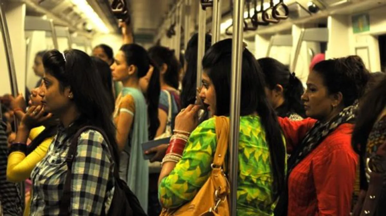 women travelling delhi metro