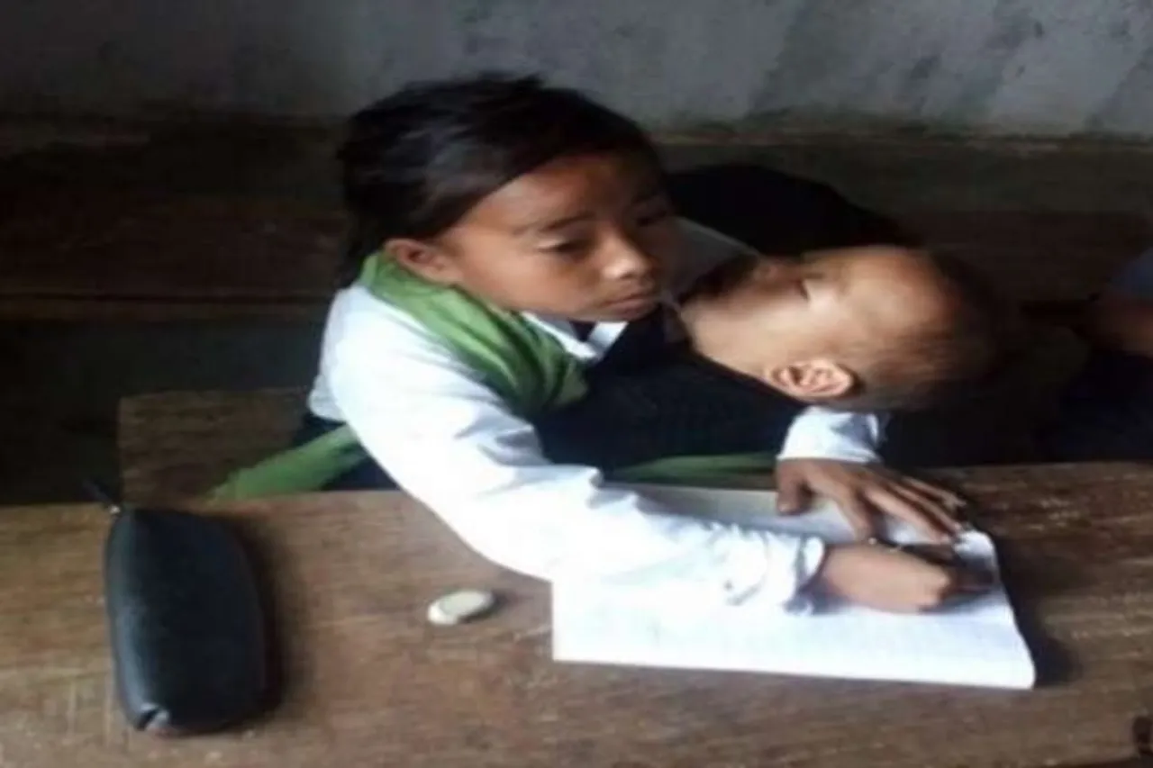 Viral Photo Of Young Girl Attending Class While Holding Sister Reaches Manipur Minister