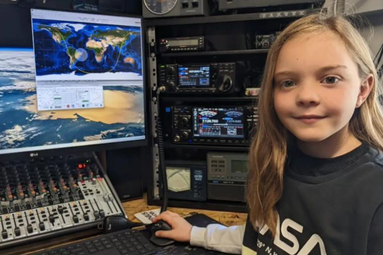 girl speaks to astronaut