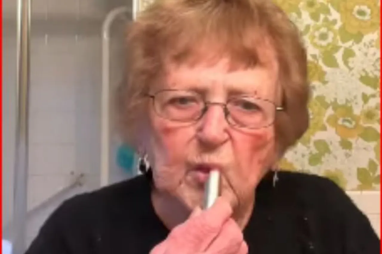 old woman gets ready for ex's funeral