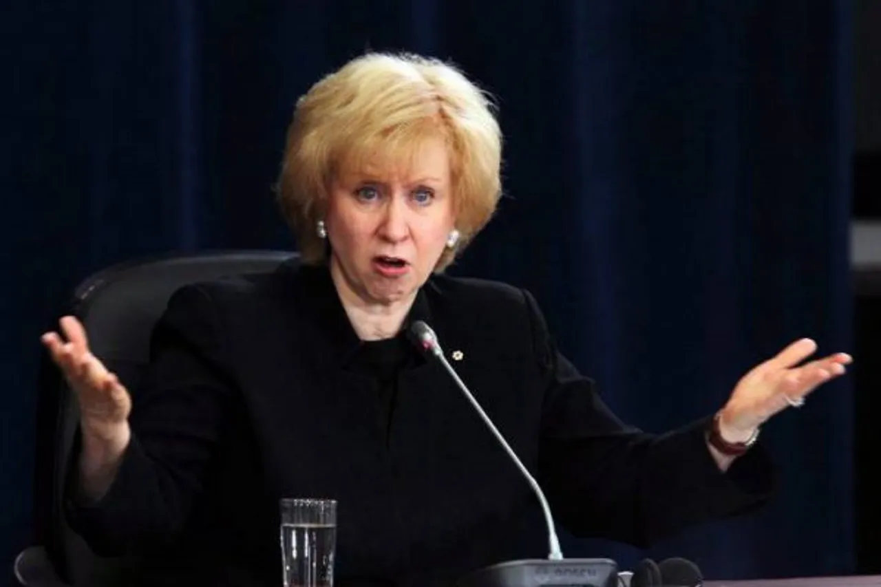 Kim Campbell Bare arms undermine credibility