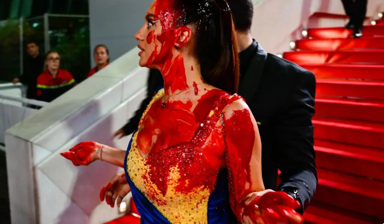 Cannes 2023: Woman Draped In Ukrainian Flag Colour Pours 'Fake Blood' On Herself