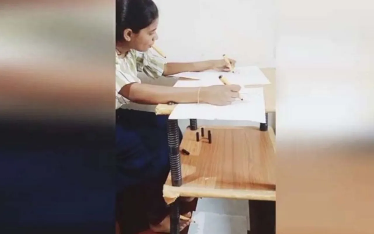 EV Divya ,Kerala Artist drawing with both hands