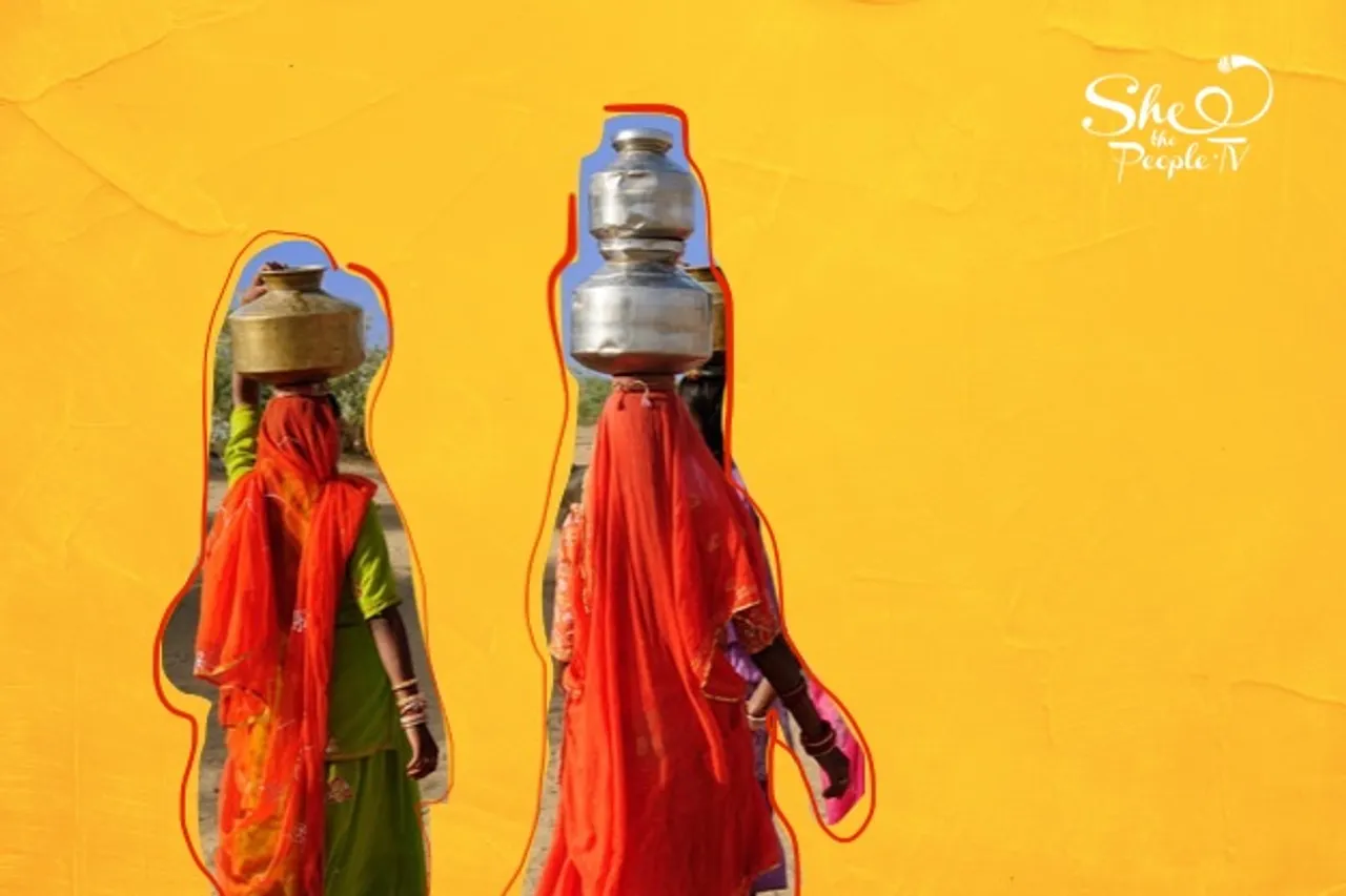 woman fetching water from well, woman fetching water from well, MP Dalit Woman ,climate change and gender, Women and water in INdia