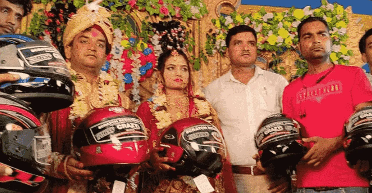 bride distributes helmets