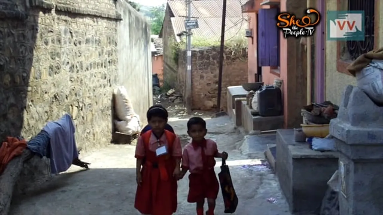Children attend preschool in a temple in Pune