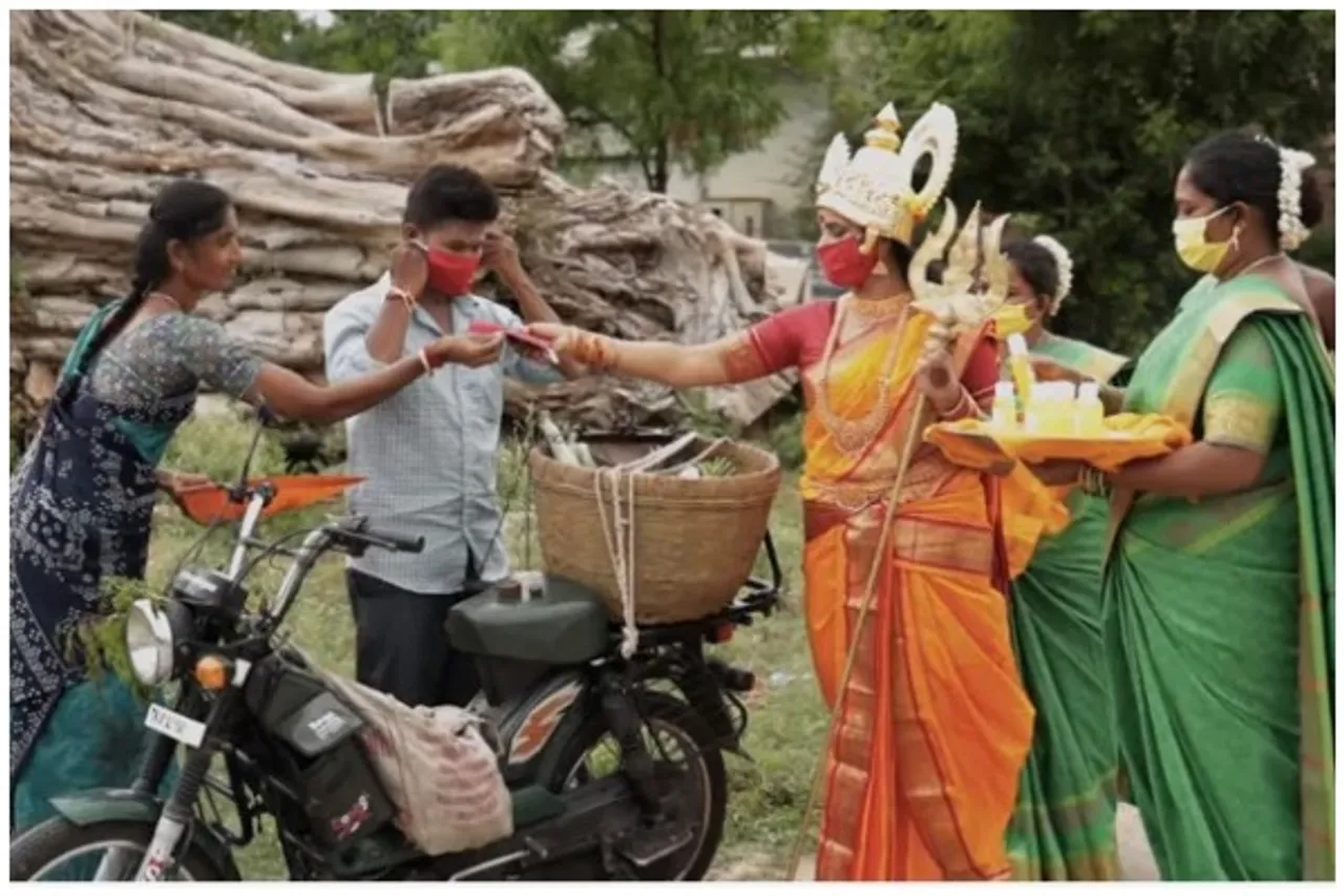 Tamil Nadu Woman Dressed As Goddess Mariamman Distributes COVID-19 Masks