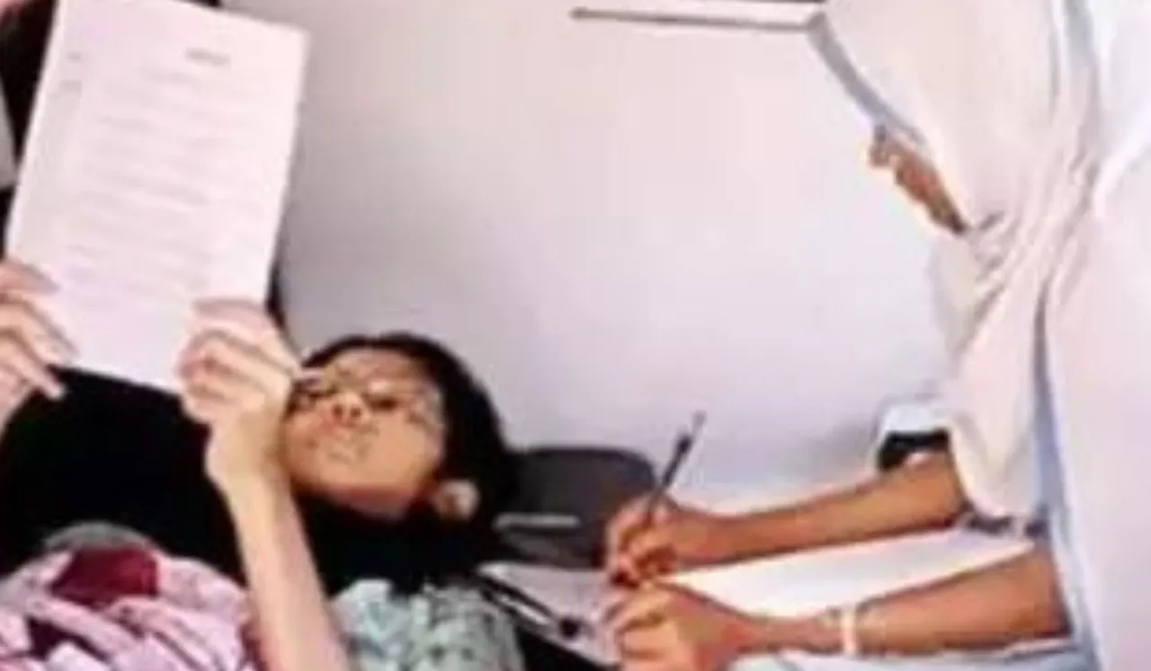 board exam paper in ambulance, Girl Writes Exam In Ambulance