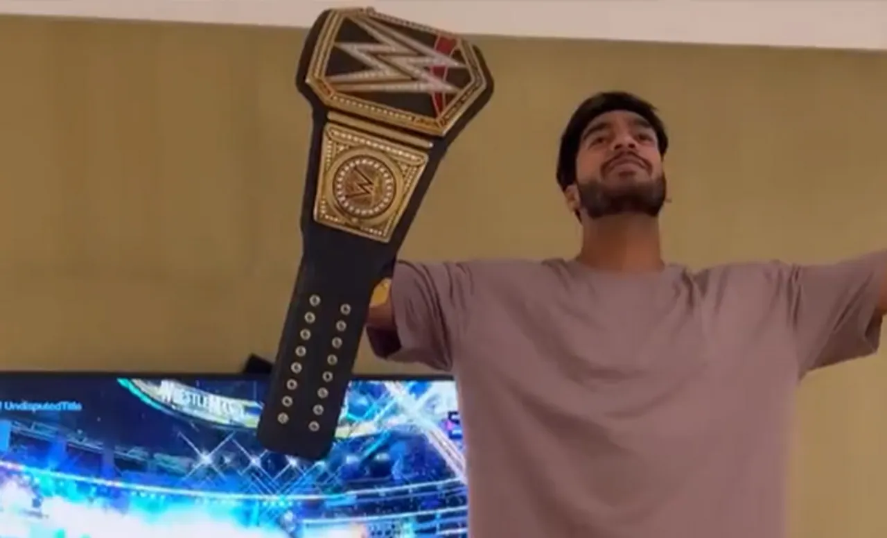 Venkatesh Iyer celebrates Roman Reigns's win