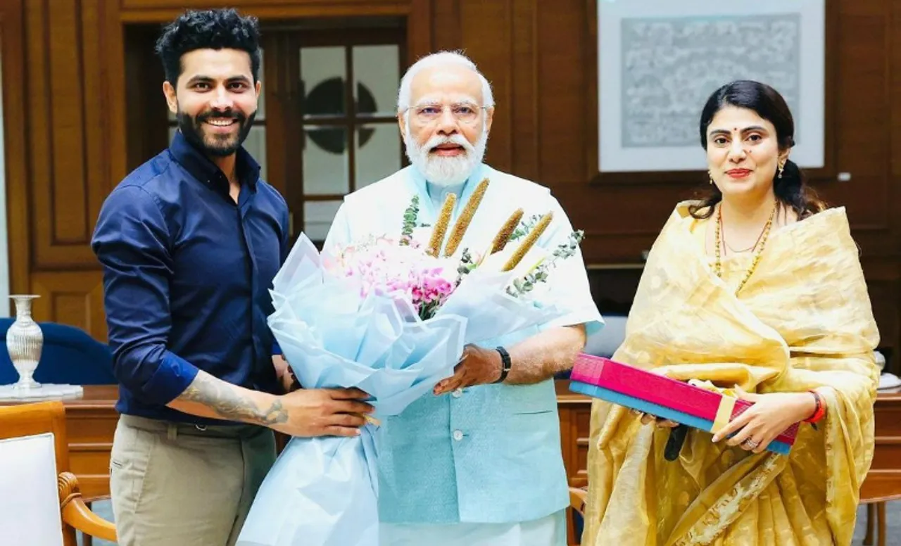 Ravindra Jadeja and his wife with Narendra Modi