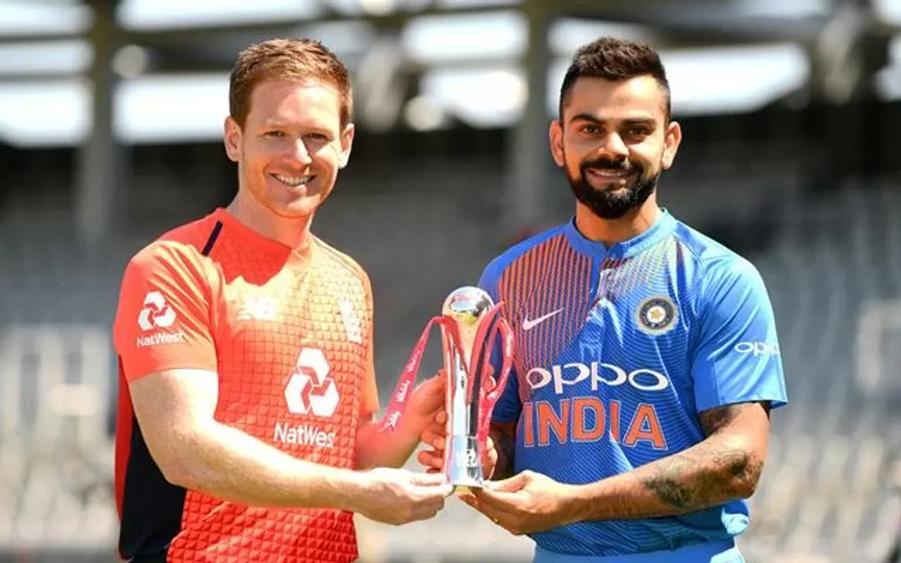 England captain Eoin Morgan and India captain Virat Kohli hold the series trophy. (Photo by Gareth Copley/Getty Images)