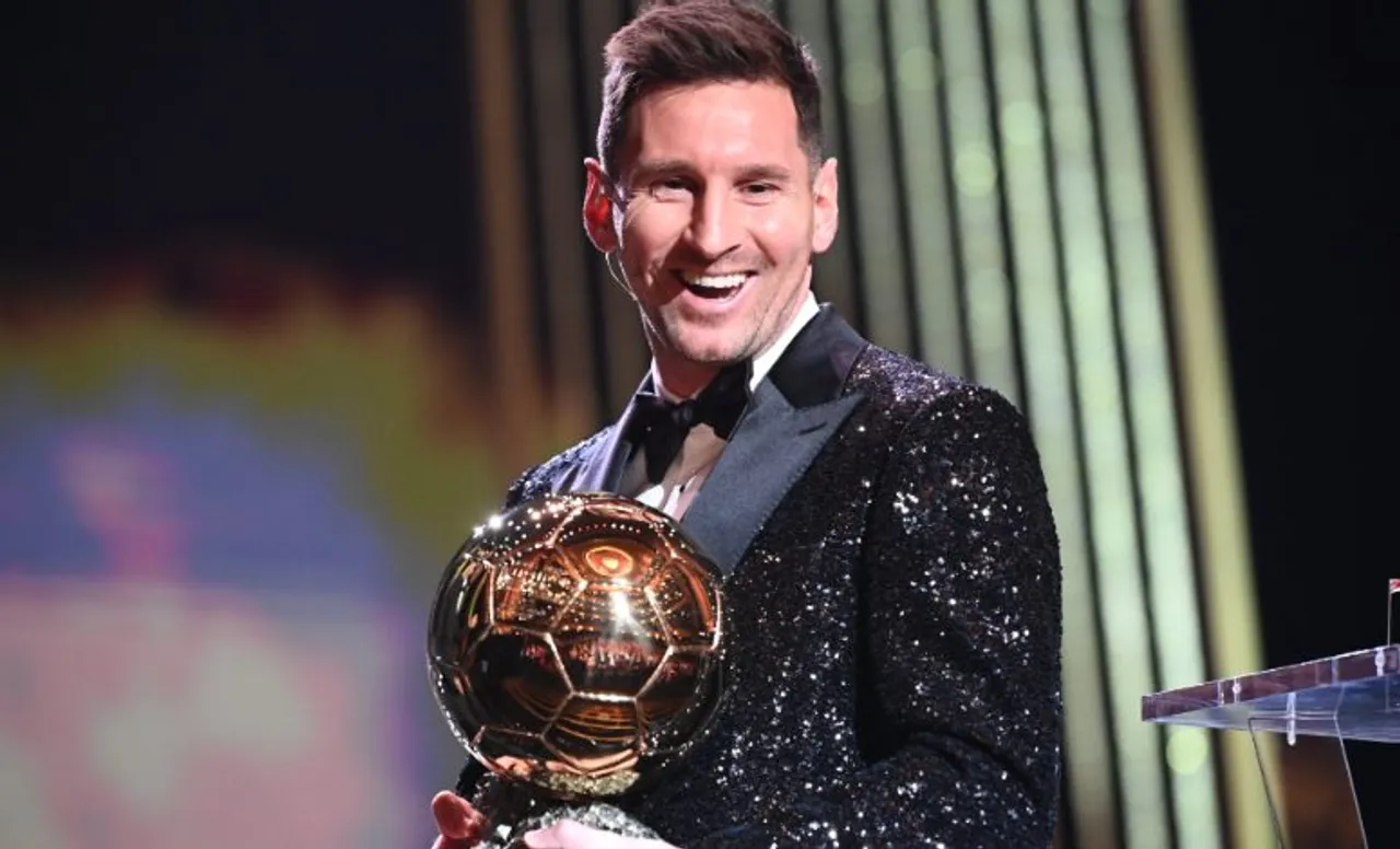 Ballon d'Or 2021 Awards: Lionel Messi reacts after winning the 2021 Ballon d'Or trophy during the 65th Ballon d'Or ceremony at Theatre du Chatelet, in Paris, Monday, Nov. 29, 2021. Messi won the Ballon d'Or for seventh time. (AP Photo/Christophe Ena)
