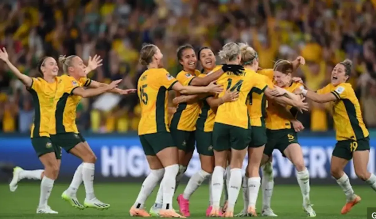 Australia players celebrate after winning the Women's World Cup quarterfinal soccer match between Australia and France