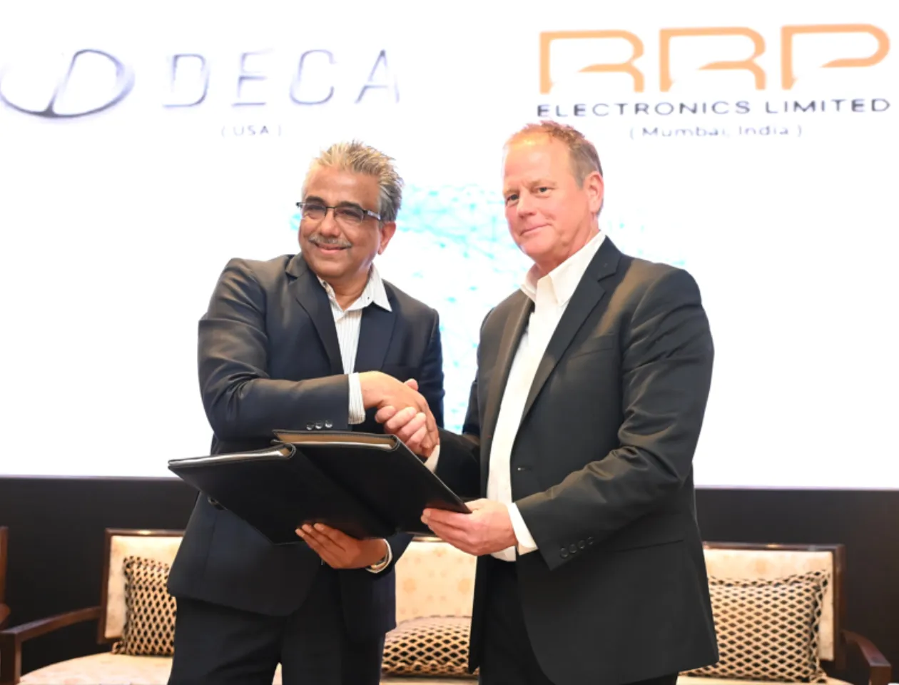 Rajendra K. Chodankar, Chairman & CEO of RRP Electronics with Tim Olson, Founder & CEO of Deca Technologies.png
