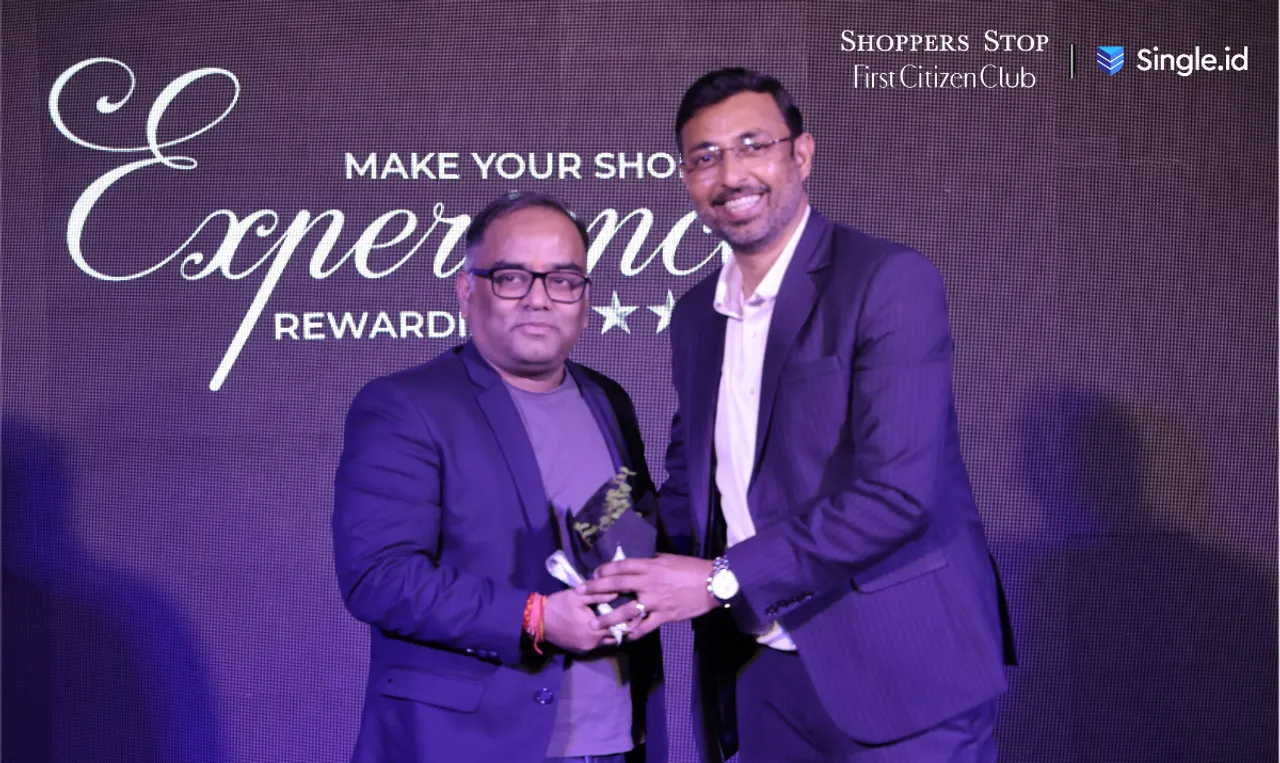 Kavindra Mishra, Customer Care Associate, Managing Director and CEO, Shoppers Stop with Chandra Bhushan, India Country Head, Enigmatic Smile.png