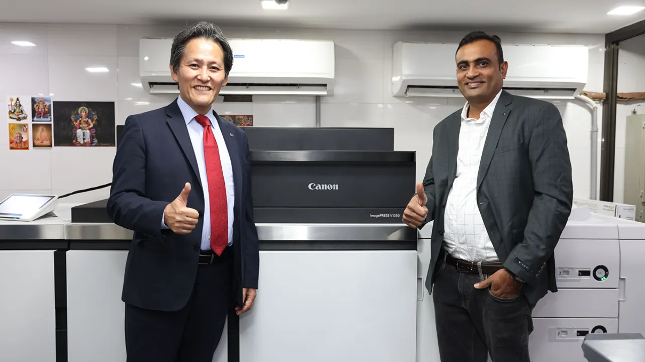 Mr. Manabu Yamazaki, President and CEO, Canon India and Mr Rajesh Mandora, Owner, Prince Graphics with the newly-launched imagePRESS V1350 
