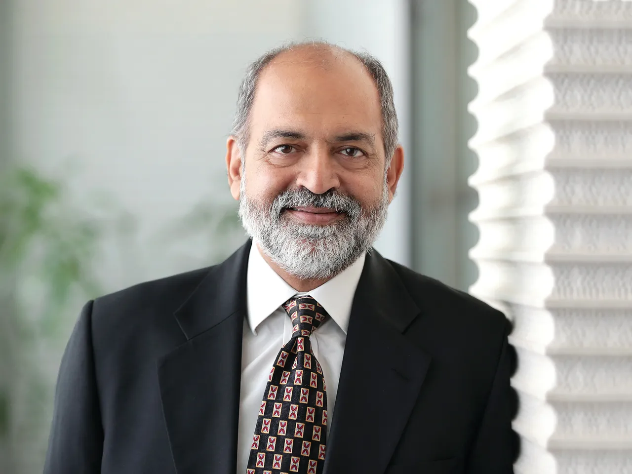 Adil Zainulbhai, QCi