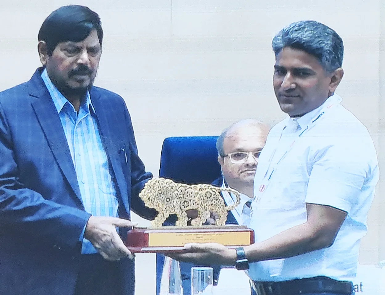 Mr. Raj Kumar, CEO,DWMPL, receiving the award by Shri Ramdas Bandu Athawale, Honorable Minister of State for Social Justice and Empowerment, and Mr. Indrajit Ghosh, Global Chairman, MSME