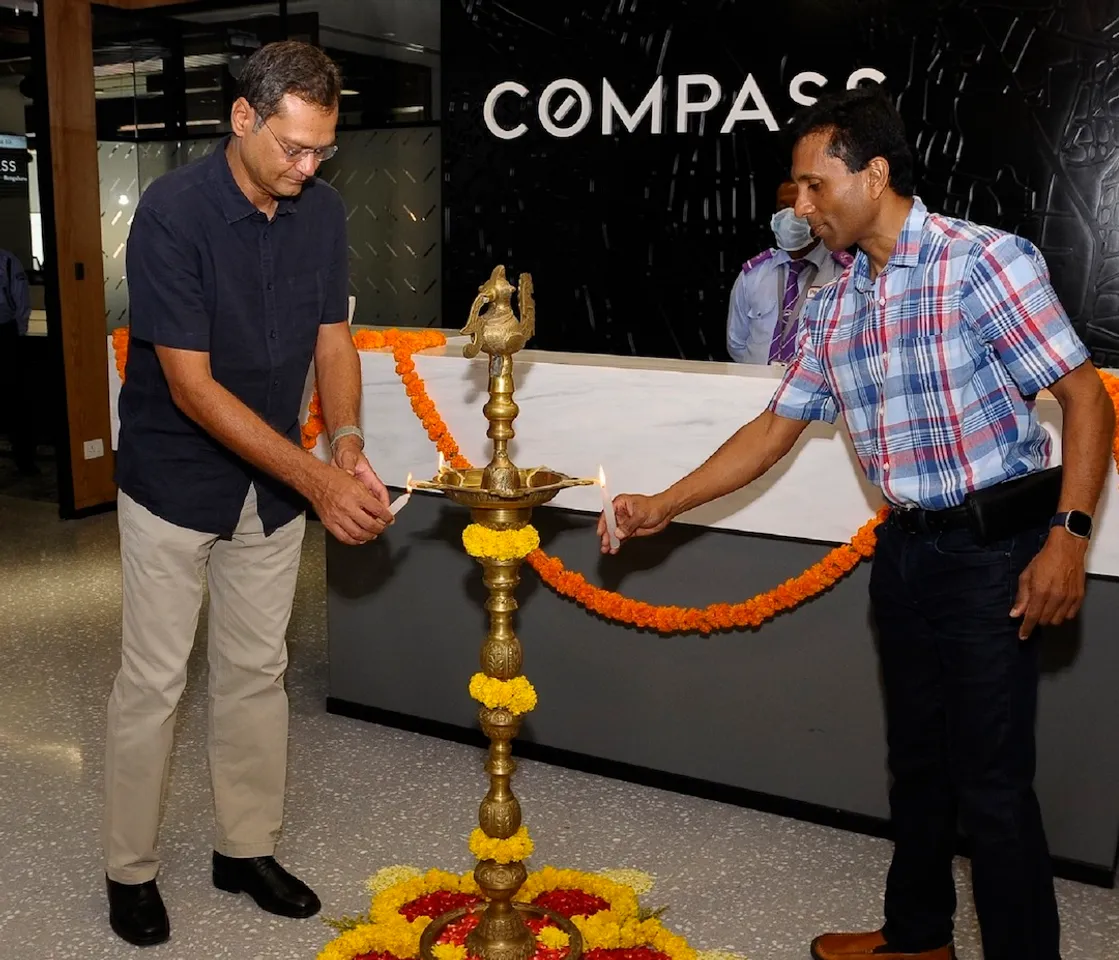 Rushi Bhatt (left) and Joseph Sirosh (right) lightening the lamp