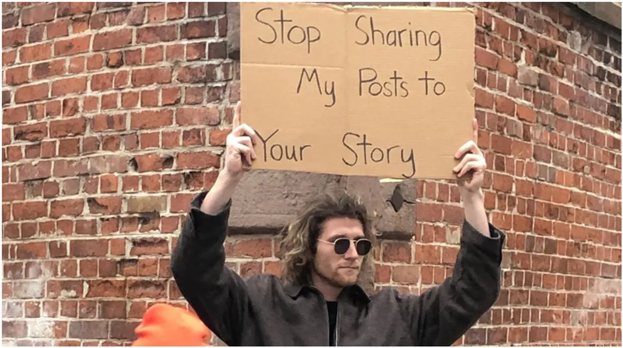 Is it a bird? Is it a plane? Nope, it's just a Dude with sign