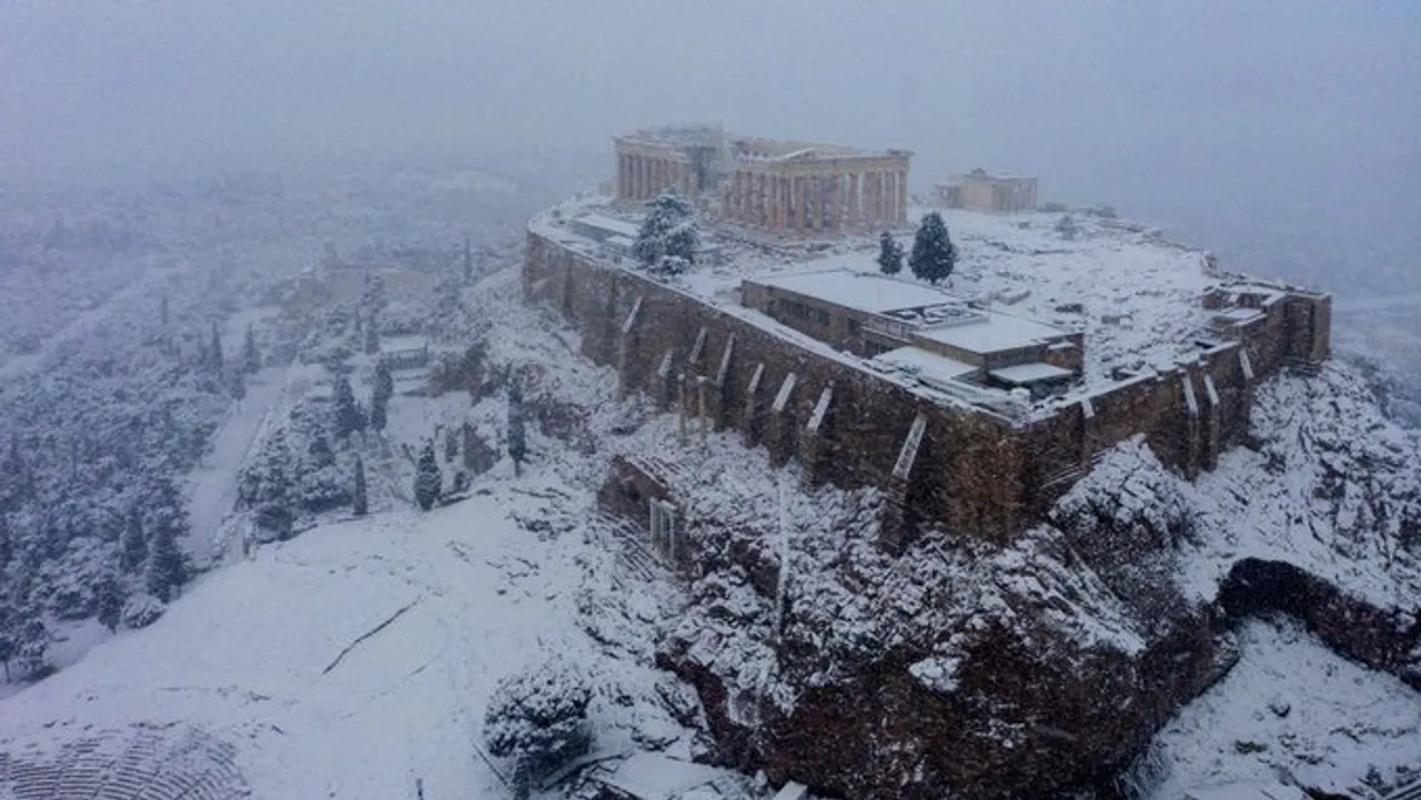Dazzling snow blanket covers the Acropolis of Athens