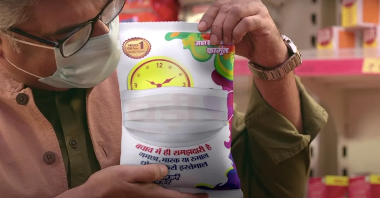 Ghadi Detergent packets dons mask to promote social distancing