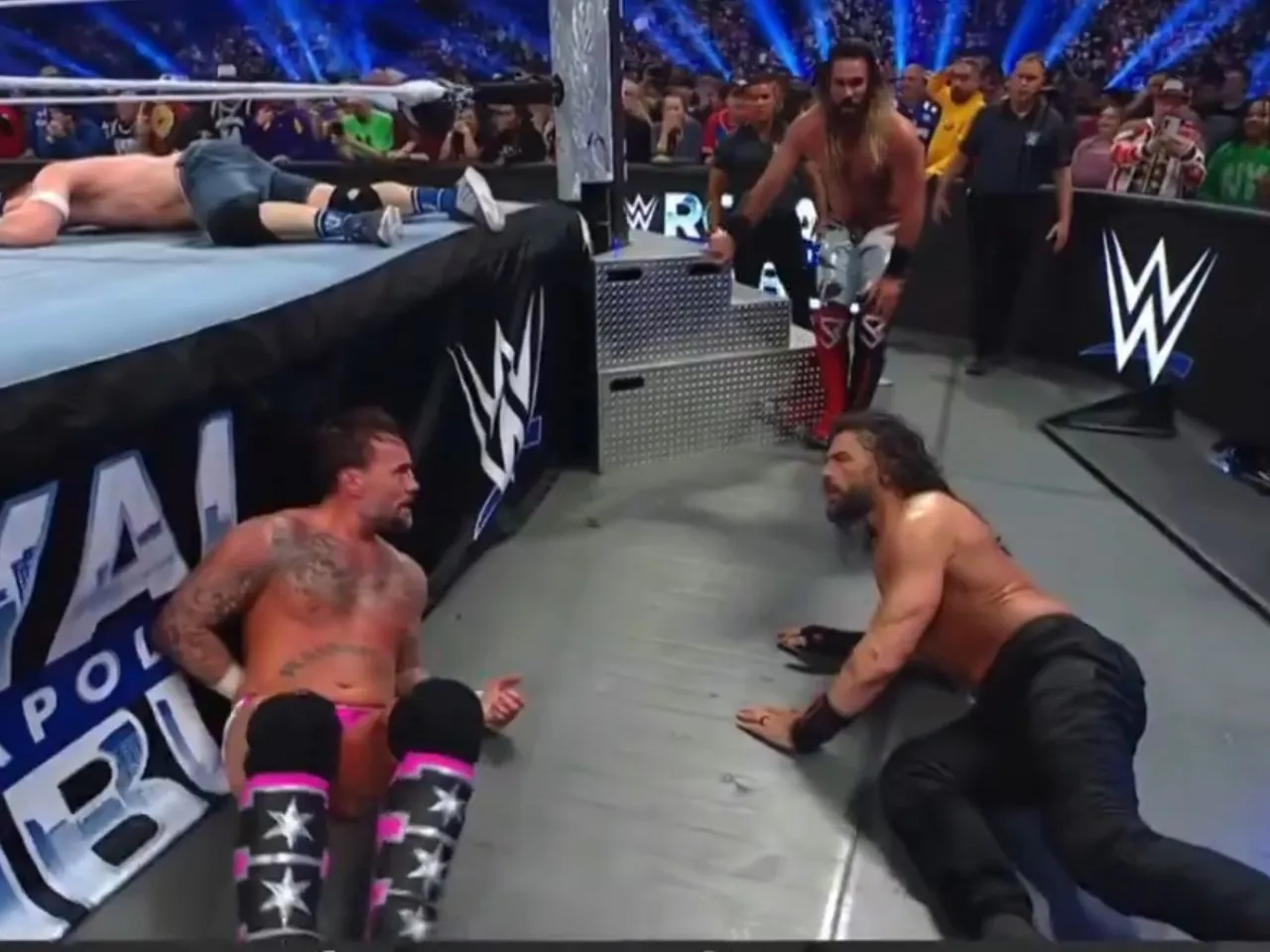 Seth Rollins attacks Roman Reigns and CM Punk after getting eliminated