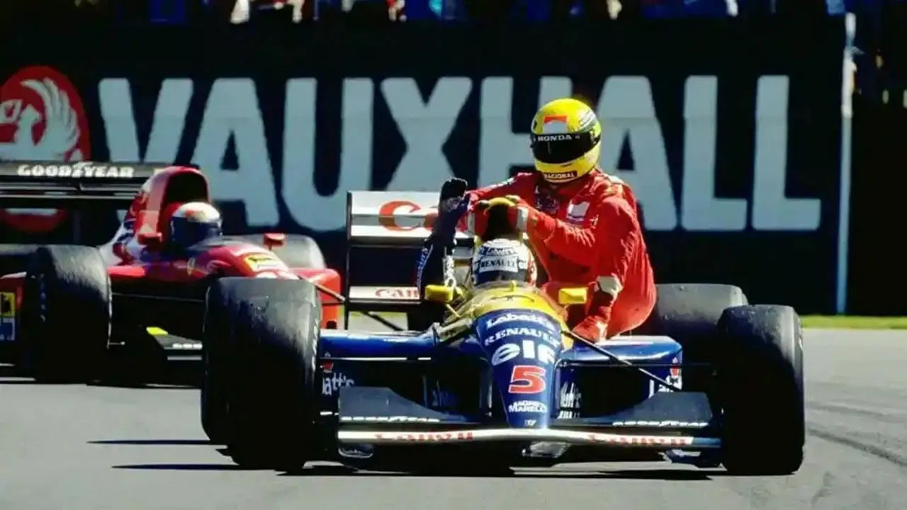 Ayrton Senna on Nigel Mansell's car