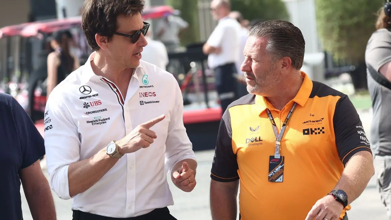 Zak Brown with Toto Wolff