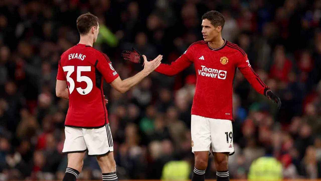 Raphael Varane and Jonny Evans