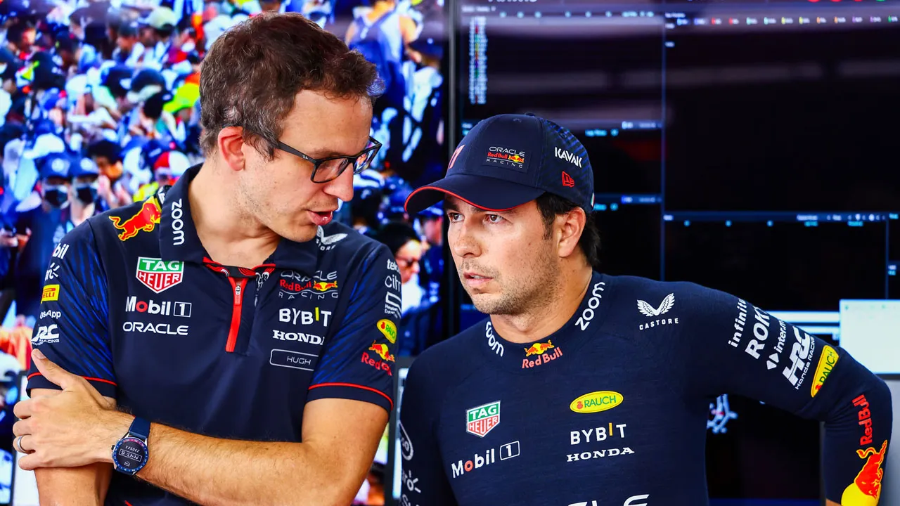 Sergio Perez with his race engineer 