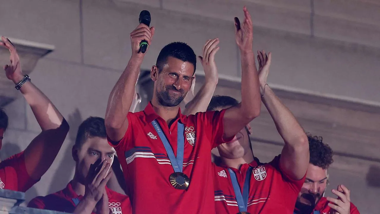 Novak Djokovic celebrates his gold medal win (Source: X)