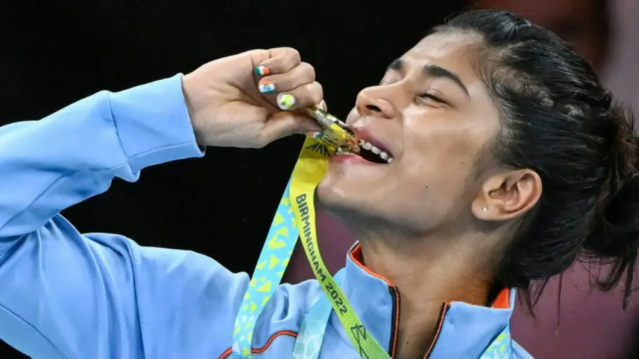 Olympian biting her medal 