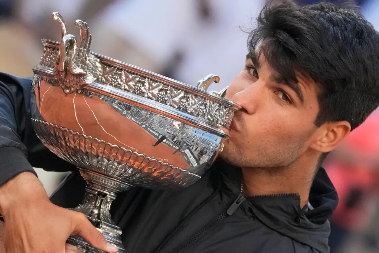 Tennis today witnesses the creation of a new all time record! Carlos Alcaraz wins the 2024 French Open defeating Alexander Zverev by (6-3),(2-6),(5-7),(6-1),(6-2). Alcaraz becomes the youngest champion to win a grand slam at all three courts - sportzpoint.com