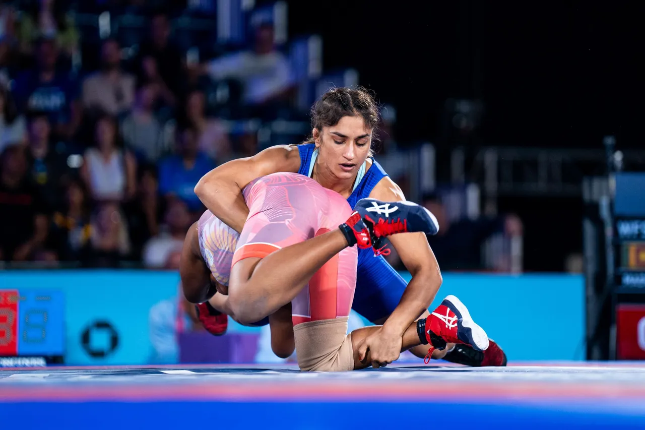 Vinesh Phogat wins Paris Olympics Quota in women's 50kg category | sportzpoint.com