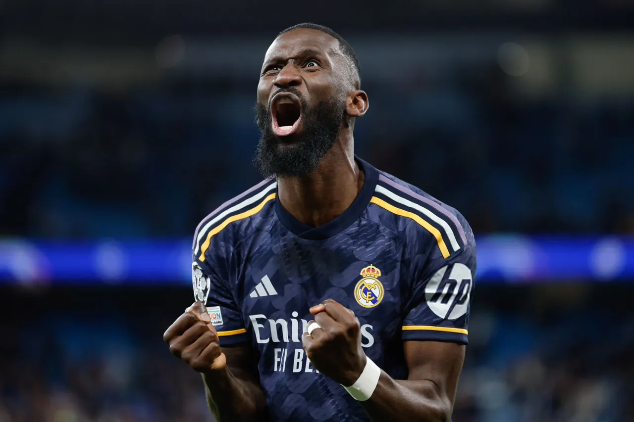 Rudiger celebrating after scoring the last penalty | sportzpoint