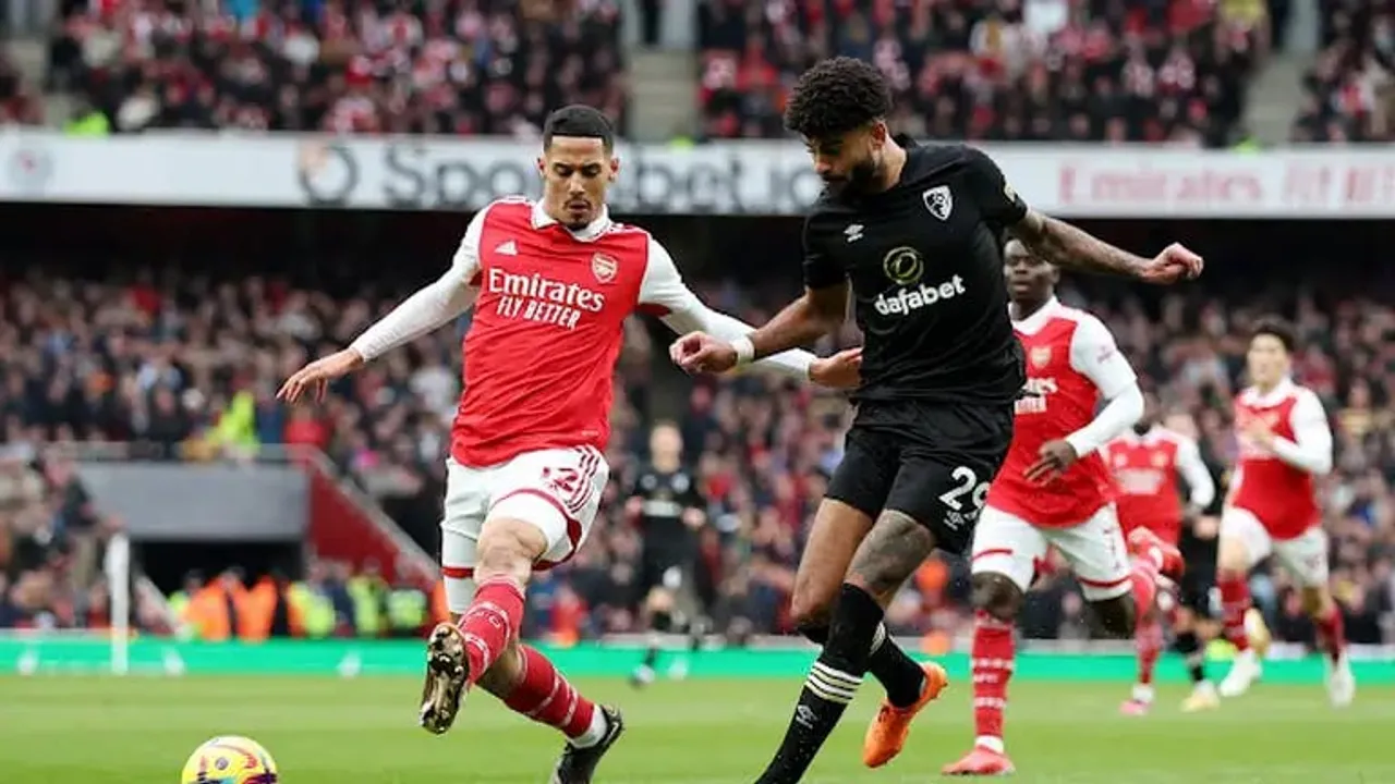 Arsenal vs Bournemouth: William Saliba trying to win the ball against Phillip Billing | Sportz Point