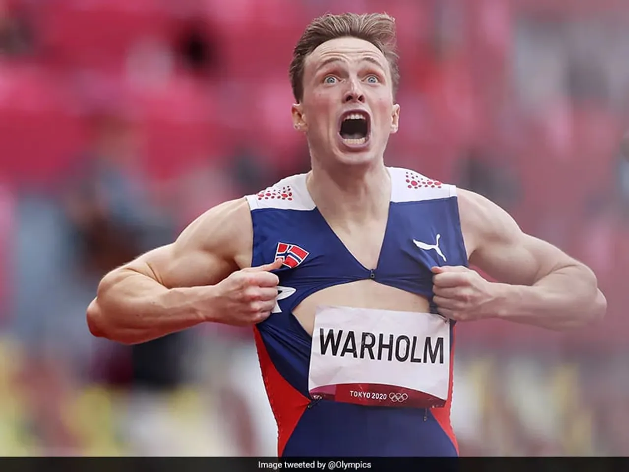 Karsten Warholm of Norway wins the men's 400-meter hurdles, setting a world record