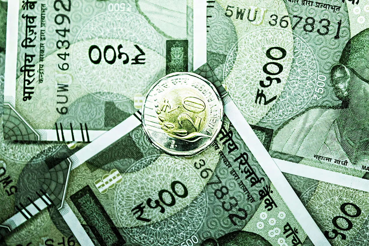 rupees notes and coin