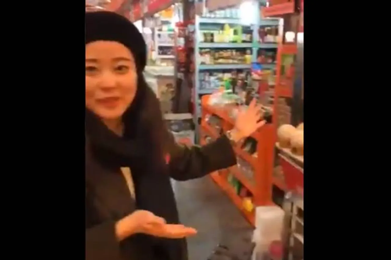 chinese guide speaks tamil with tourists viral video - சீனா வரும் சுற்றுலாப் பயணிகளுக்கு தமிழில் பெருமைகளைச் சொல்லும் சீனப் பெண் (வீடியோ)